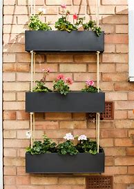 Image result for Fence Hanging Planters Outdoor