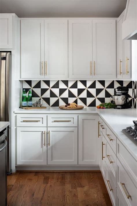 Outstanding kitchen design! ~ We love the gold detail.   Kitchen tiles  