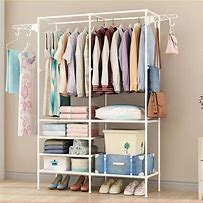 Image result for clothing hanger racks for laundry rooms