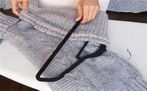 Image result for Fold Sweater On Hanger