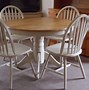 Image result for Pottery Barn Round Dining Table Hidden Leaf