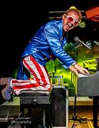 Image result for Elton John Troubadour