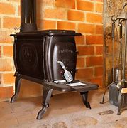 Image result for Wood-Burning Cast Iron Pot Belly Stoves