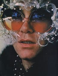 Image result for Elton John Face 70s