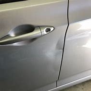 Image result for Dented Car Drivers Door