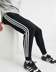 Image result for Black and Red Stiped Trackies