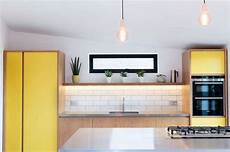 Trend Alert: Bright Yellow Kitchens with Painted Kitchen Cabinets