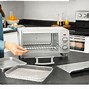 Image result for Black & Decker Crisp 'N Bake Air Fry 4-Slice Toaster Oven, Silver