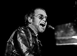Image result for Cartoon of Elton John