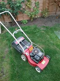 Image result for Cheap Riding Lawn Mowers Clearance