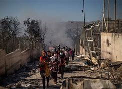 Image result for Spain migrant camp fire