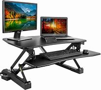 Image result for Hydraulic Sit-Stand Desk
