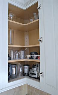 Image result for Upper Corner Cabinet Storage Solutions