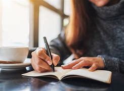 Image result for Woman Writing at Desk Not Stock
