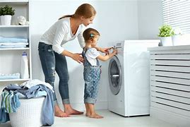 Image result for Women Washing Clothes Machine
