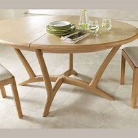 Image result for Oval Extendable Dining Table