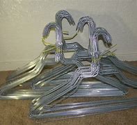 Image result for Metal and Wood Coat Hangers