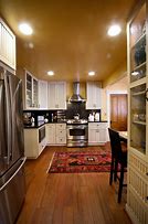 Image result for Black Stainless Steel Appliances Rust Color Walls