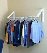 Image result for How to Fold Pants On Hanger