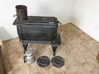 Image result for Antique Cast Iron Wood Stove 28