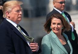 Image result for Nancy Pelosi with a Trump Hat