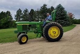 Image result for John Deere 4025 R Tractor