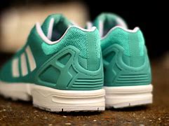 Image result for Adidas Puff Jacket