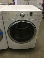 Image result for A Whirlpool Duet Steam Front Load Washer and Dryer