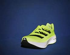 Image result for Yellow Adidas Barricade Shoes