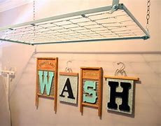 Image result for Laundry Room Clothes Hanger Racks