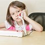 Image result for Child Practicing Writing at Desk