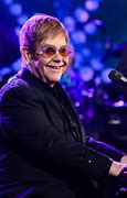 Image result for Elton John's Guitar Player