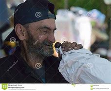 Image result for public domain picture of homeless man drinking