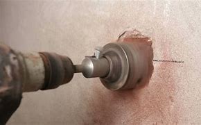 Image result for Drill Hole in Brick Wall