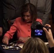 Image result for Pelosi Commemorative Impeachment Pins