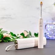 Image result for Sonic Electric Toothbrush