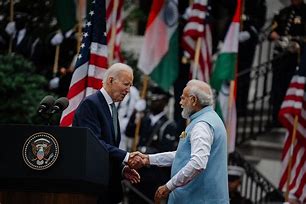 Image result for Pic of Joe Biden Shaking Hands