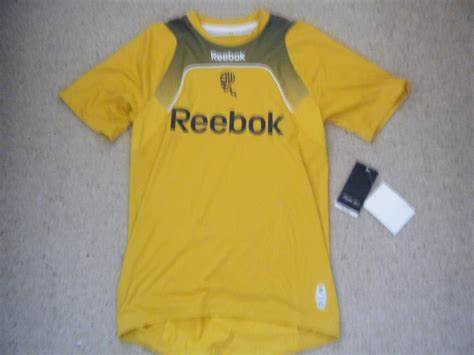 Bolton Wanderers Away shirt. An interesting mustard colour that didn't ...