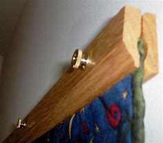 Image result for Wooden Quilt Hangers for Walls