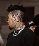 Image result for Chris Brown Tattoos Pic of Shoe On Face