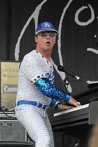 Image result for Elton John in Baseball Outfit
