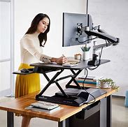 Image result for Adjustable Standing Desk to Sit and Stand