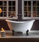 Image result for Woodbridge Crowley 31.5-In W X 67-In L White With Oil Rubbed Bronze Trim Acrylic Oval Center Drain Freestanding Soaking Bathtub Stainless Steel
