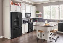 Image result for white appliances with black countertops