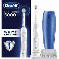 Image result for Oral-B Crossaction 3D White Electric Toothbrush