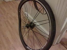 Image result for Dented Rim Wall Bicycle