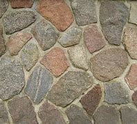 Image result for Deckorators Cast Stone Post Covers 42 Inch - Beige Stacked Stone - 1Pc