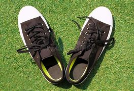 Image result for All-Black Sneakers
