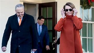 Image result for Nancy Pelosi and Charles Schumer Wearing Kente