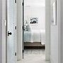 Image result for Wooden Louvered Sliding Closet Doors